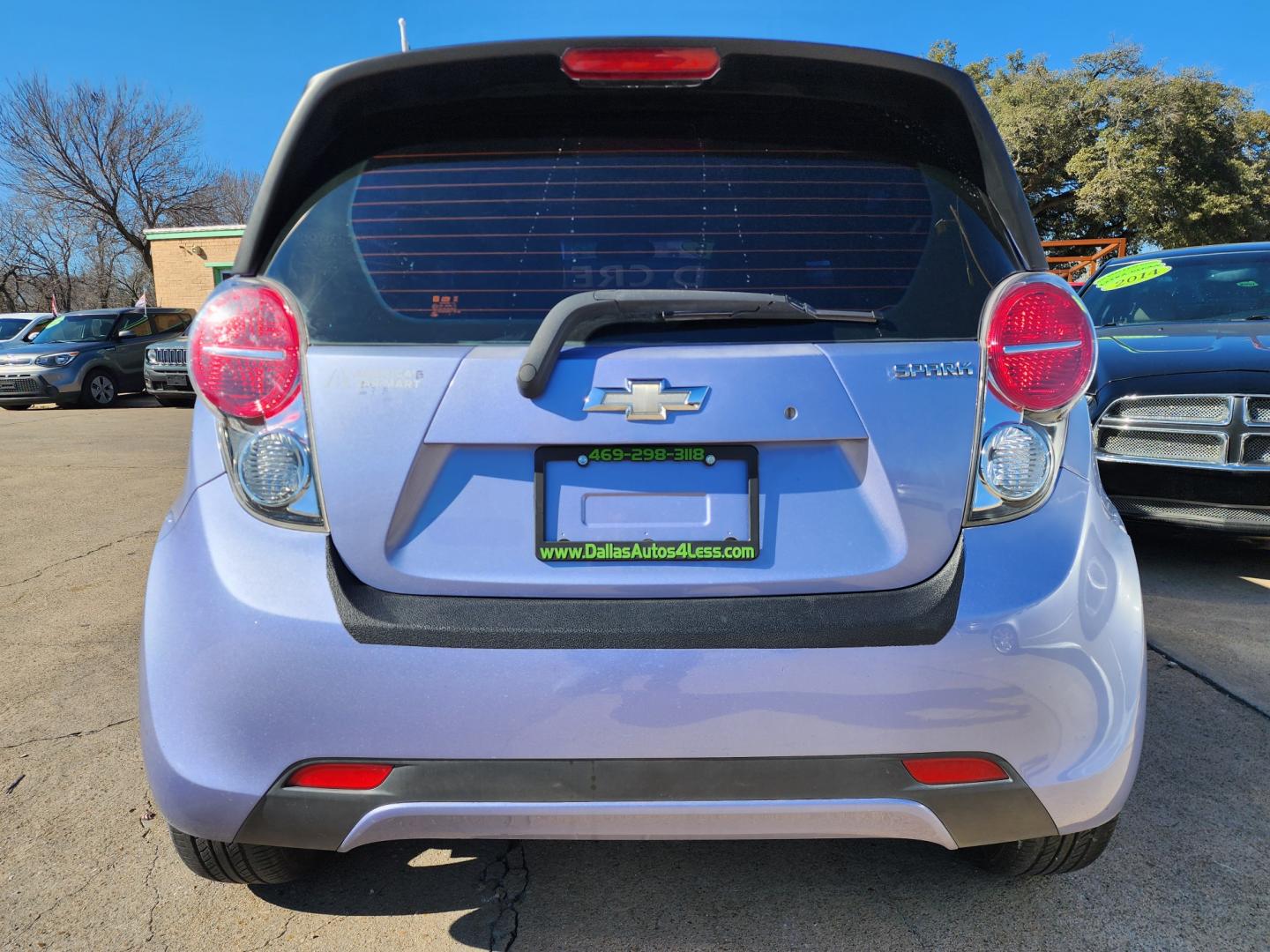 2015 BLUE /BLACK Chevrolet Spark LS (KL8CB6S93FC) with an 1.2L L4 16V DOHC engine, Continuously Variable Transmission transmission, located at 2660 S.Garland Avenue, Garland, TX, 75041, (469) 298-3118, 32.885551, -96.655602 - Welcome to DallasAutos4Less, one of the Premier BUY HERE PAY HERE Dealers in the North Dallas Area. We specialize in financing to people with NO CREDIT or BAD CREDIT. We need proof of income, proof of residence, and a ID. Come buy your new car from us today!! This is a very well cared for 2015 CH - Photo#4